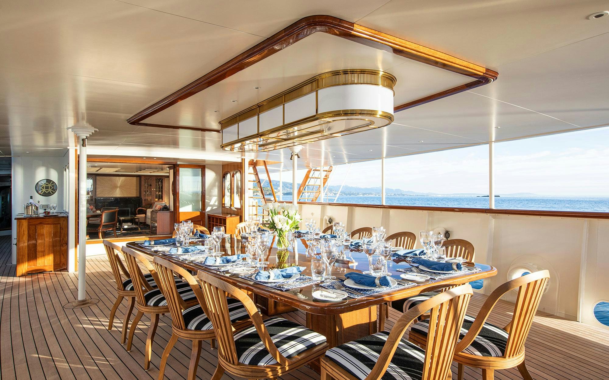 a dining room with a table set aboard MARALA Yacht for Charter