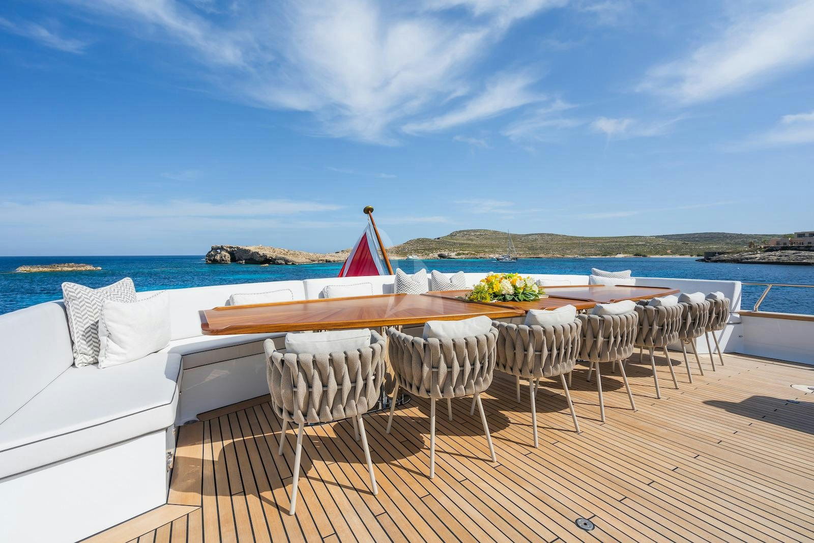 a table set for a wedding aboard EMERALD Yacht for Charter