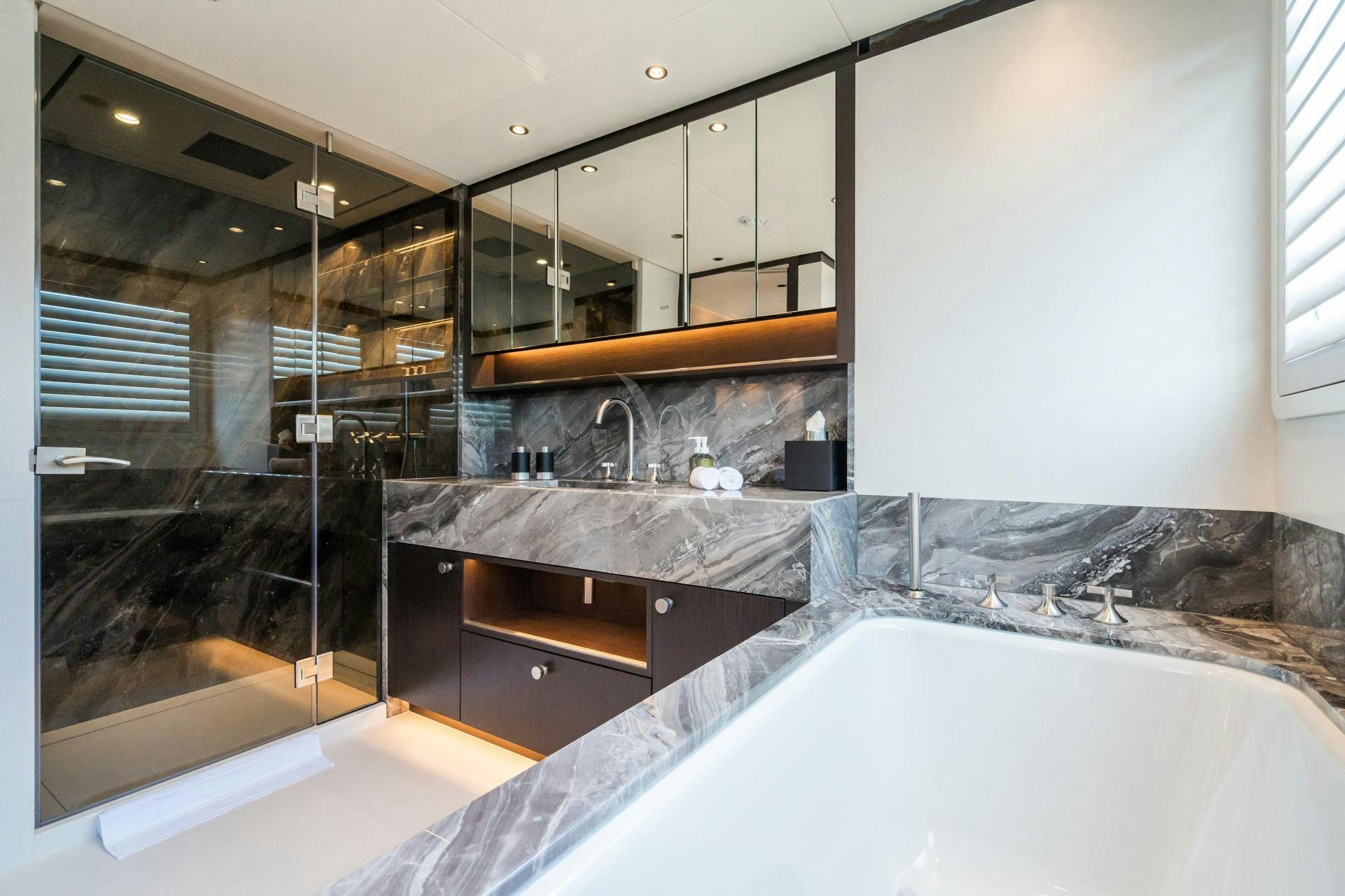 a large bathroom with a large tub aboard EMERALD Yacht for Charter