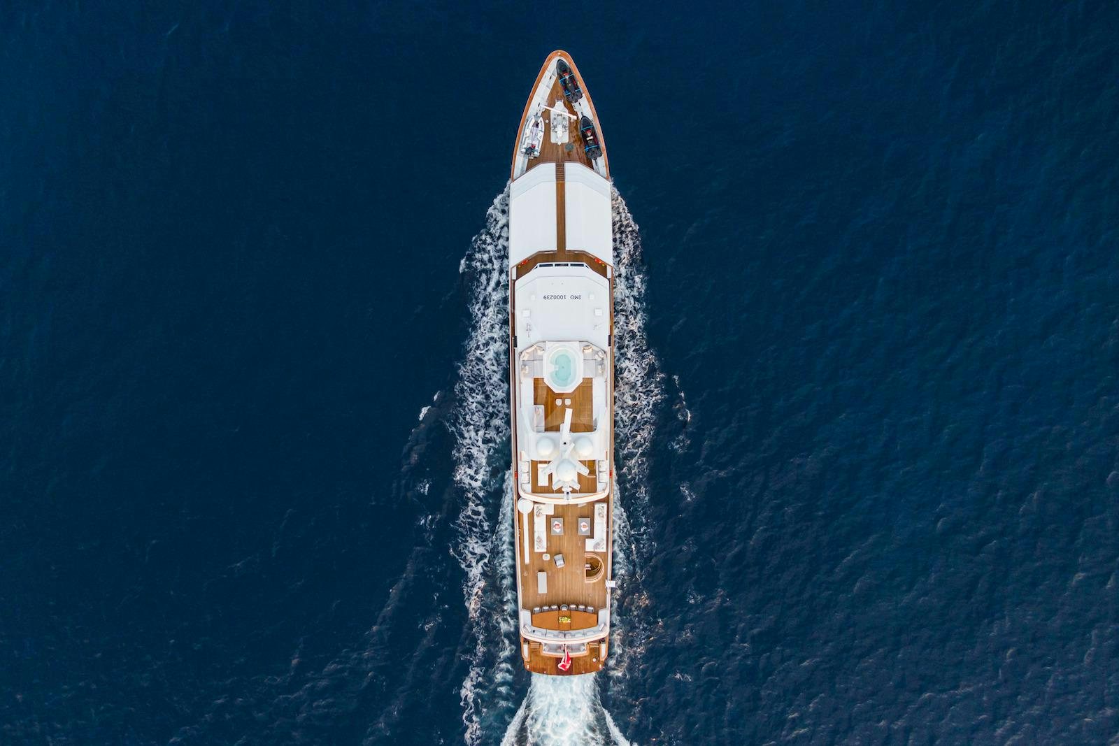 a rocket with a gold design aboard EMERALD Yacht for Charter