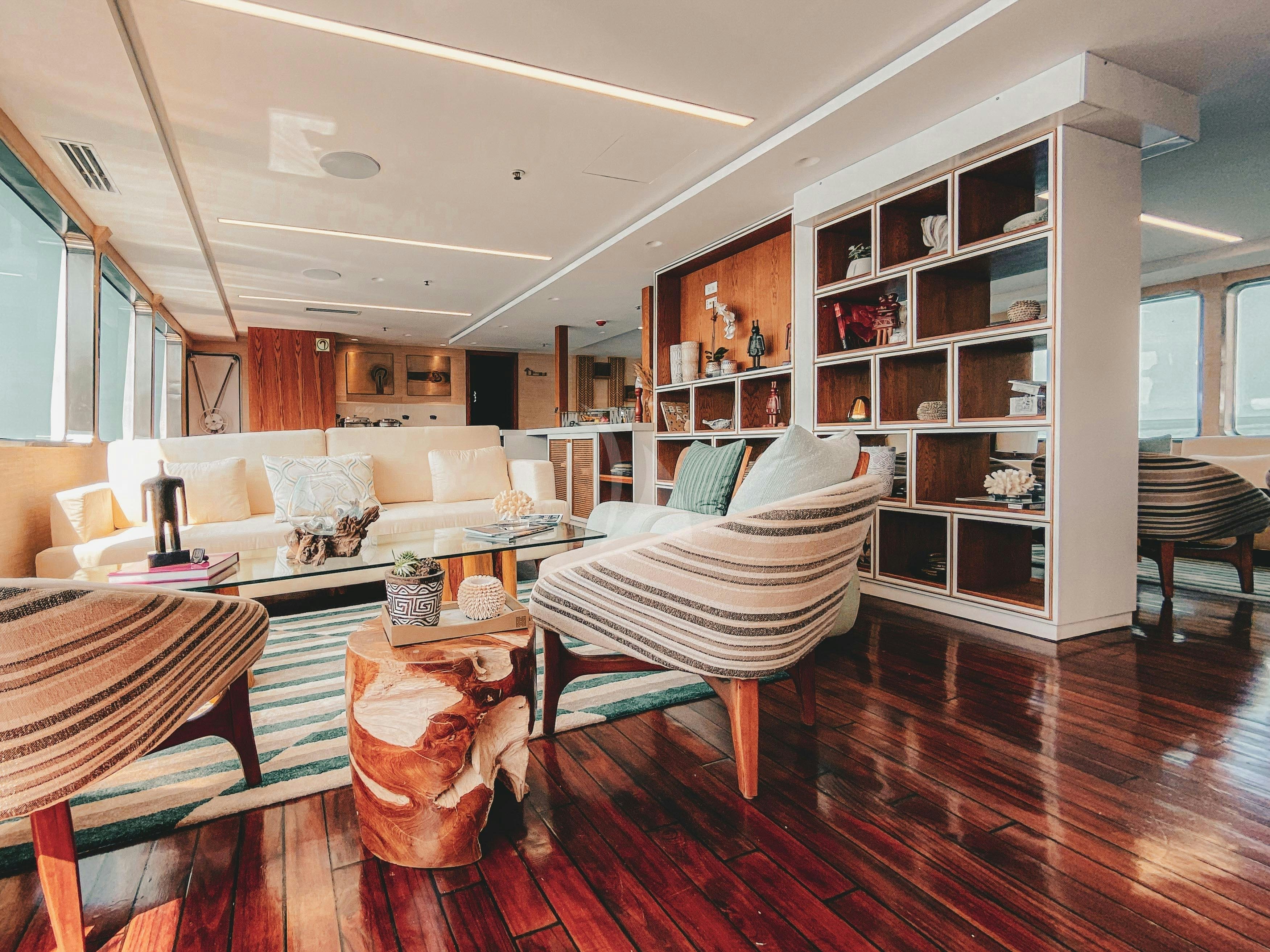 a room with a table and chairs aboard KONTIKI WAYRA Yacht for Charter