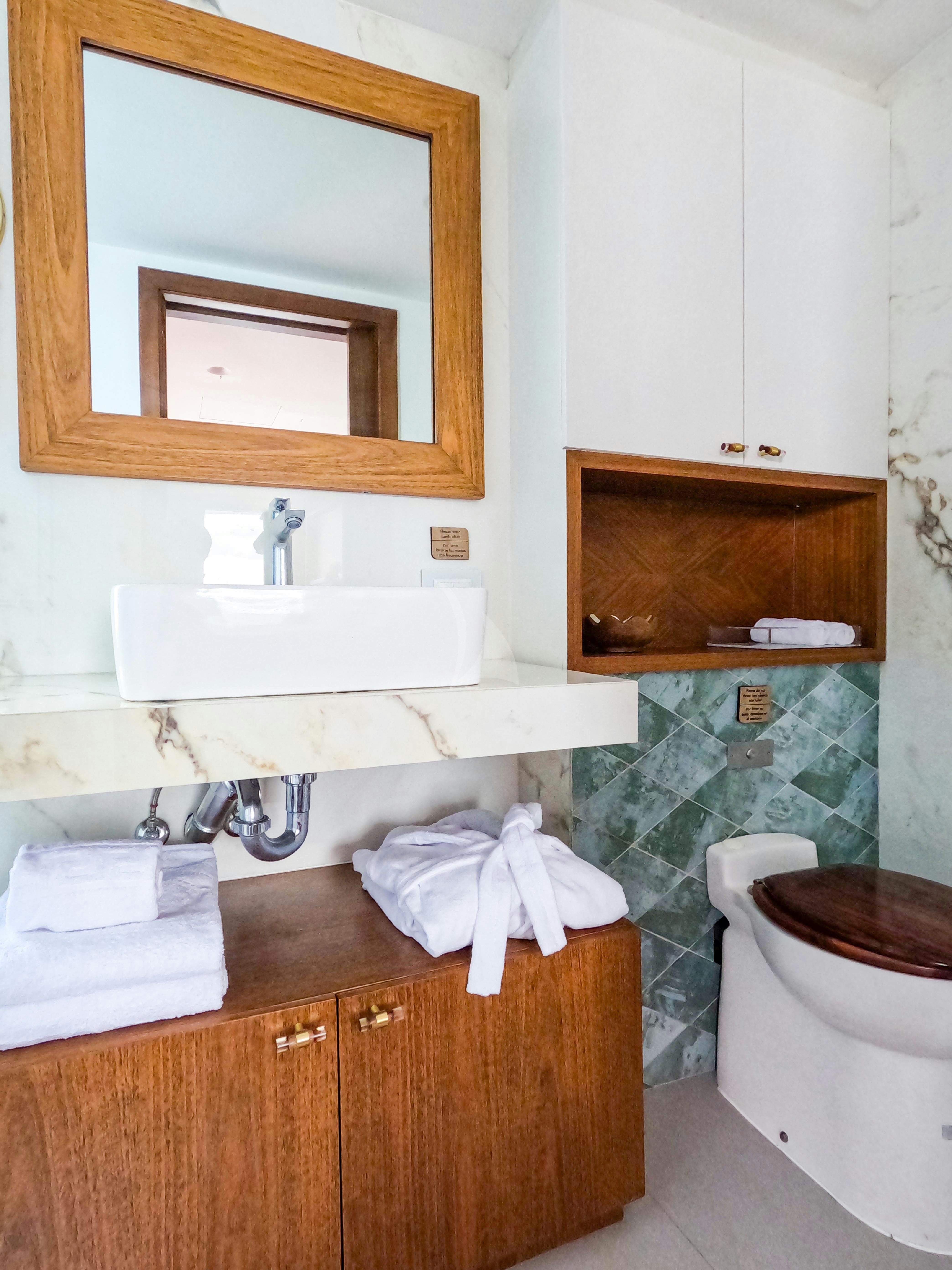 a bathroom with a sink and toilet aboard KONTIKI WAYRA Yacht for Charter