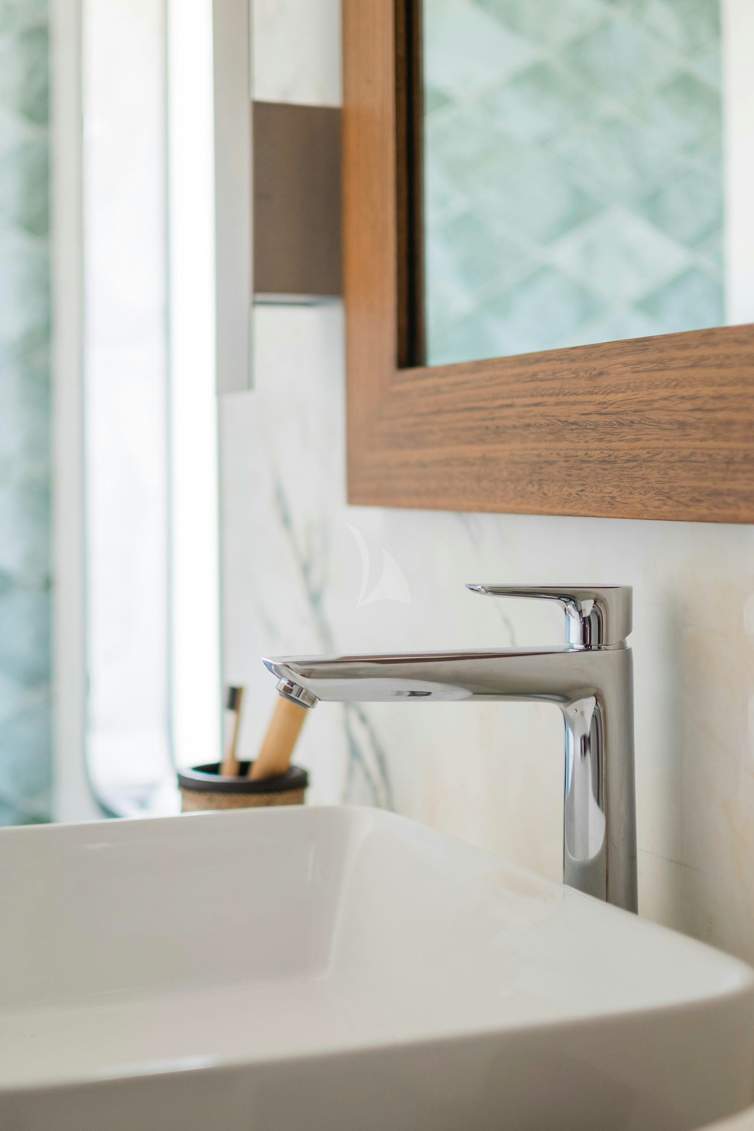 a sink with a faucet aboard KONTIKI WAYRA Yacht for Charter