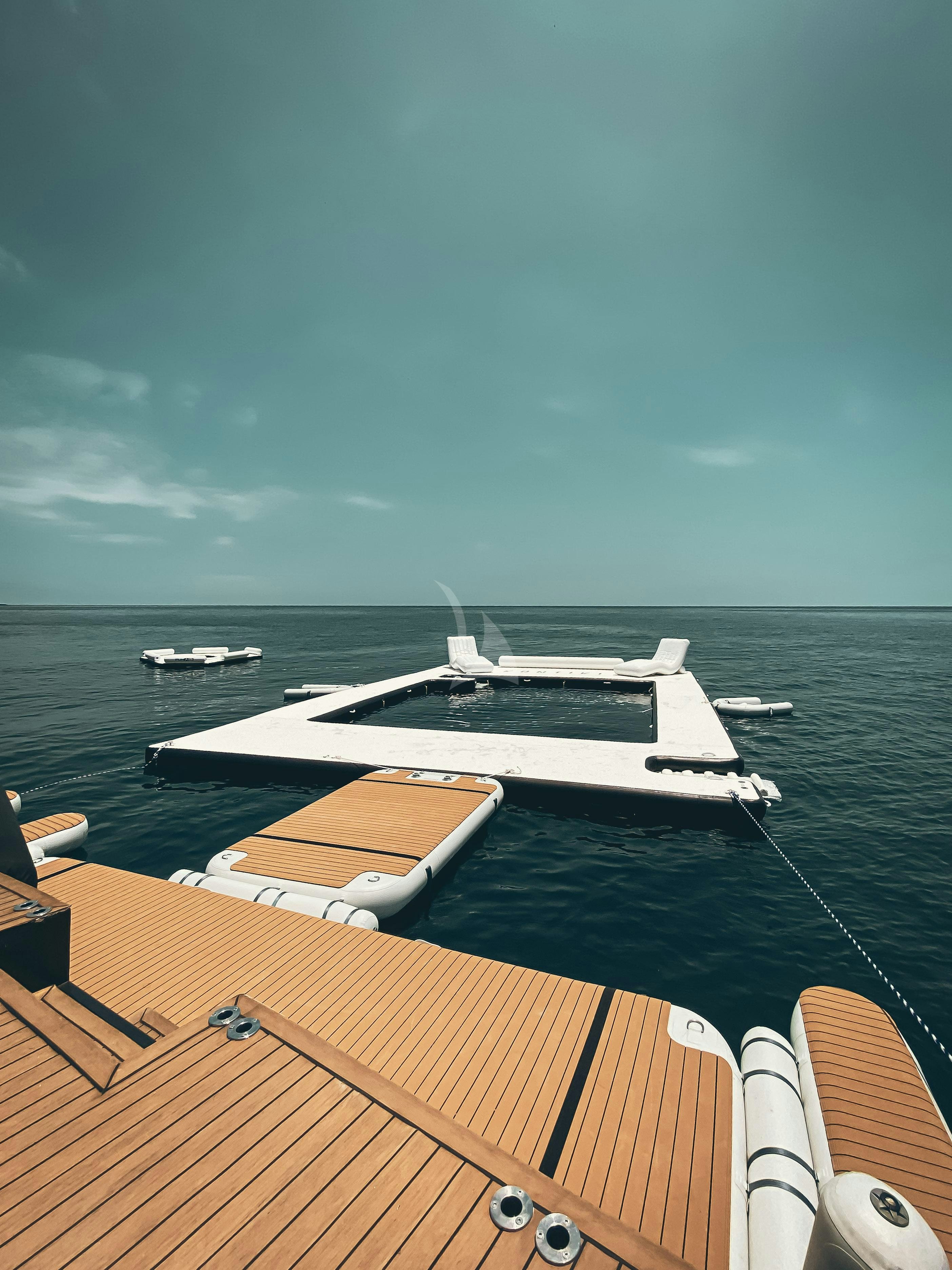 a deck with boats on it aboard KONTIKI WAYRA Yacht for Charter