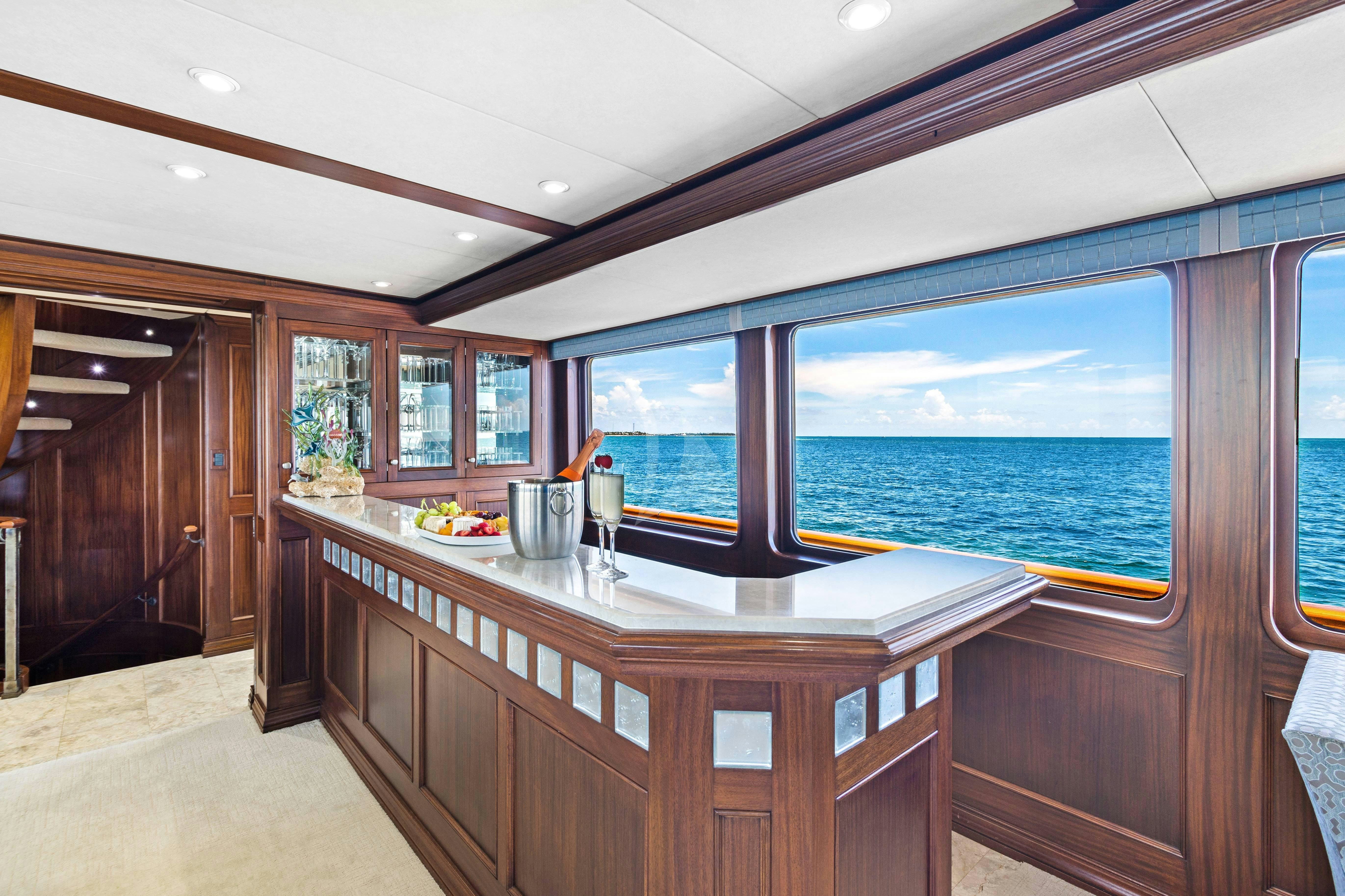 a large kitchen with a large window aboard GITANA Yacht for Charter