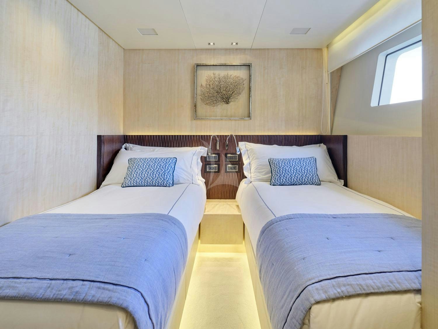 a couple of beds in a room aboard RARE DIAMOND Yacht for Charter
