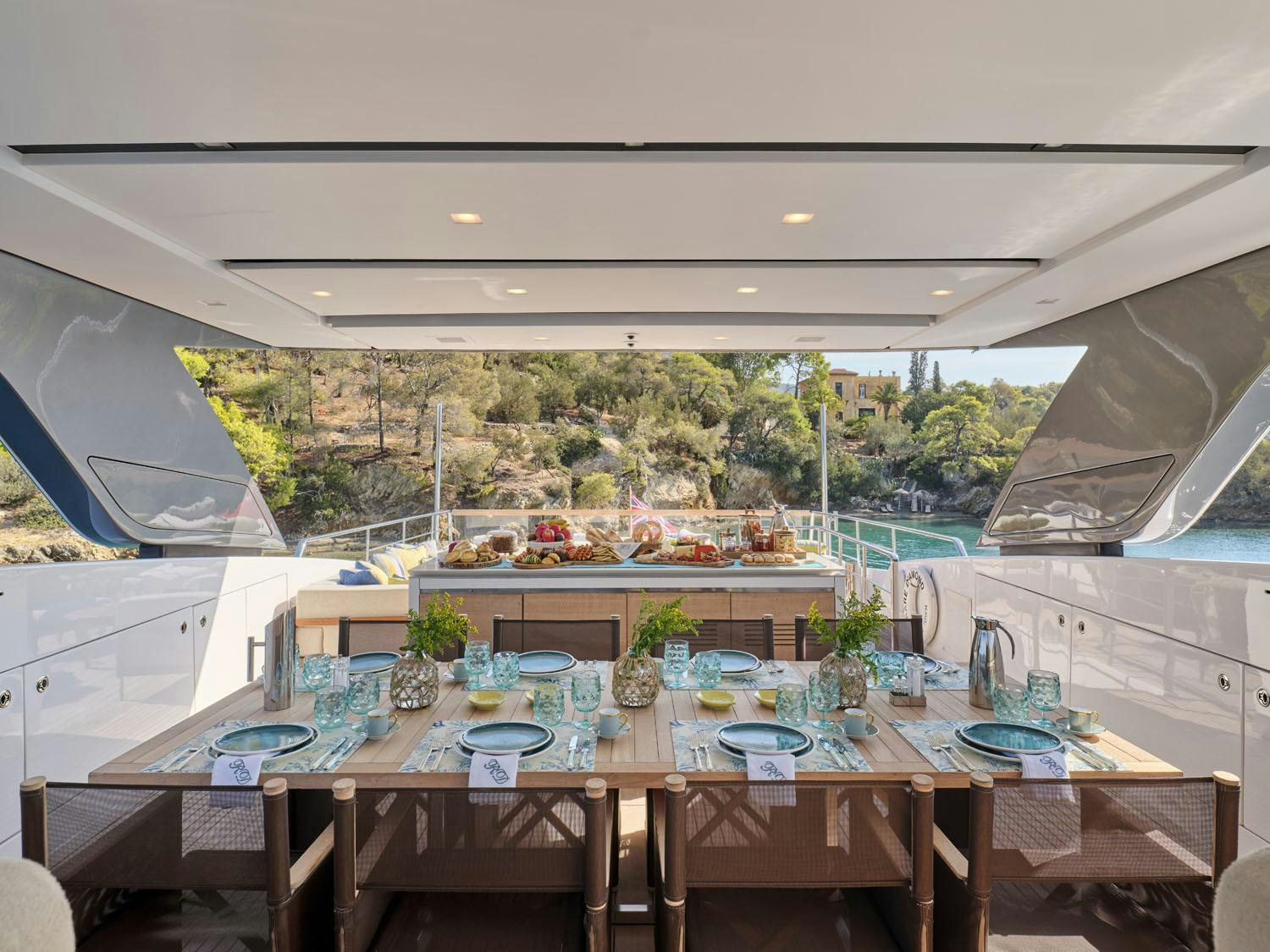 a large kitchen with a large glass window aboard RARE DIAMOND Yacht for Charter