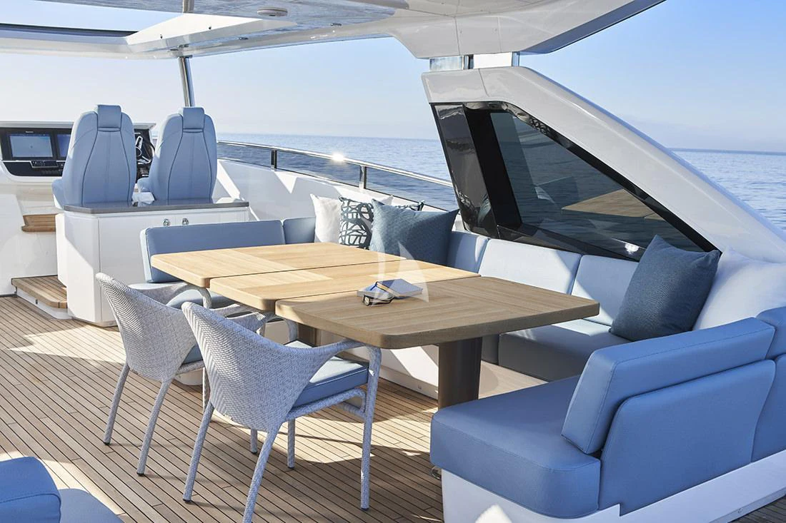 a table and chairs on a boat aboard HALLELUJAH Yacht for Charter