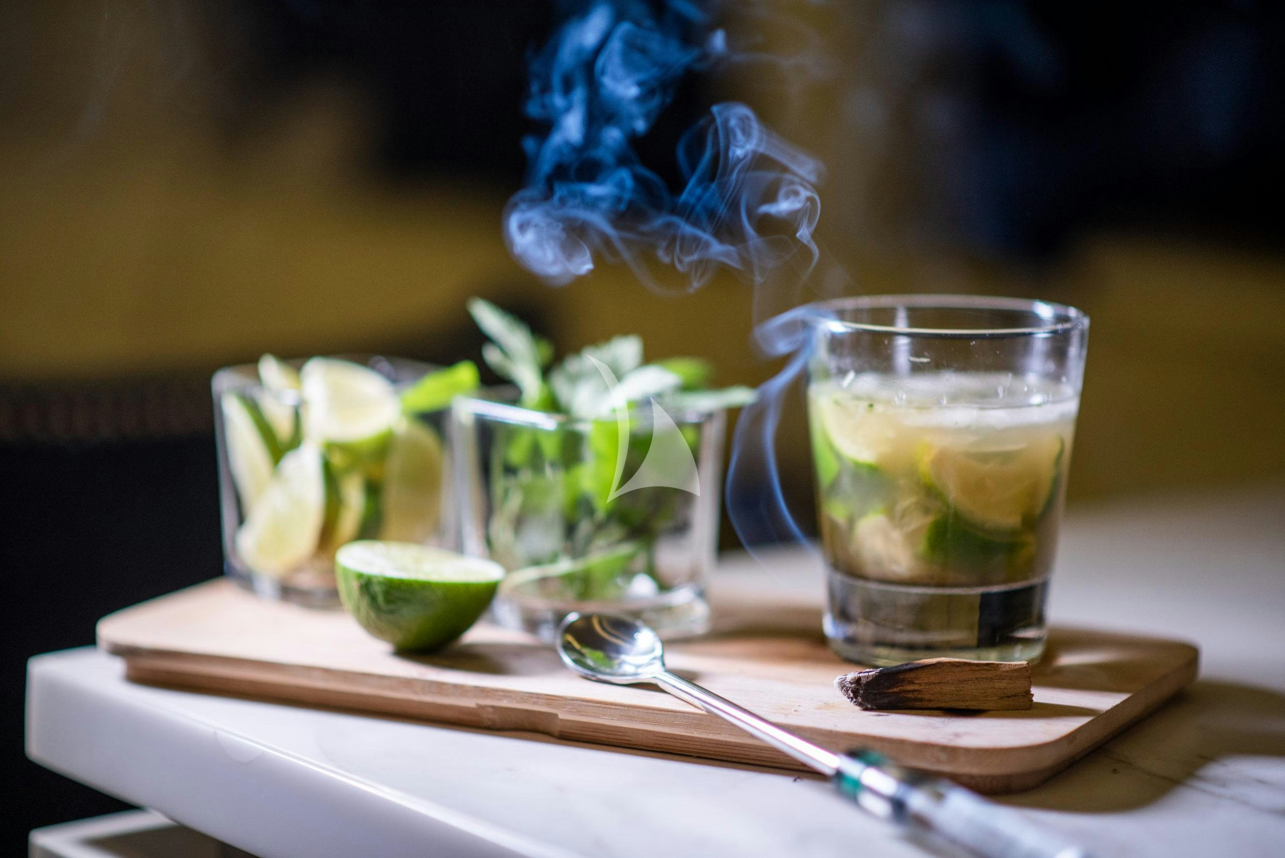 a table with glasses and food on it aboard BUNDALONG Yacht for Charter