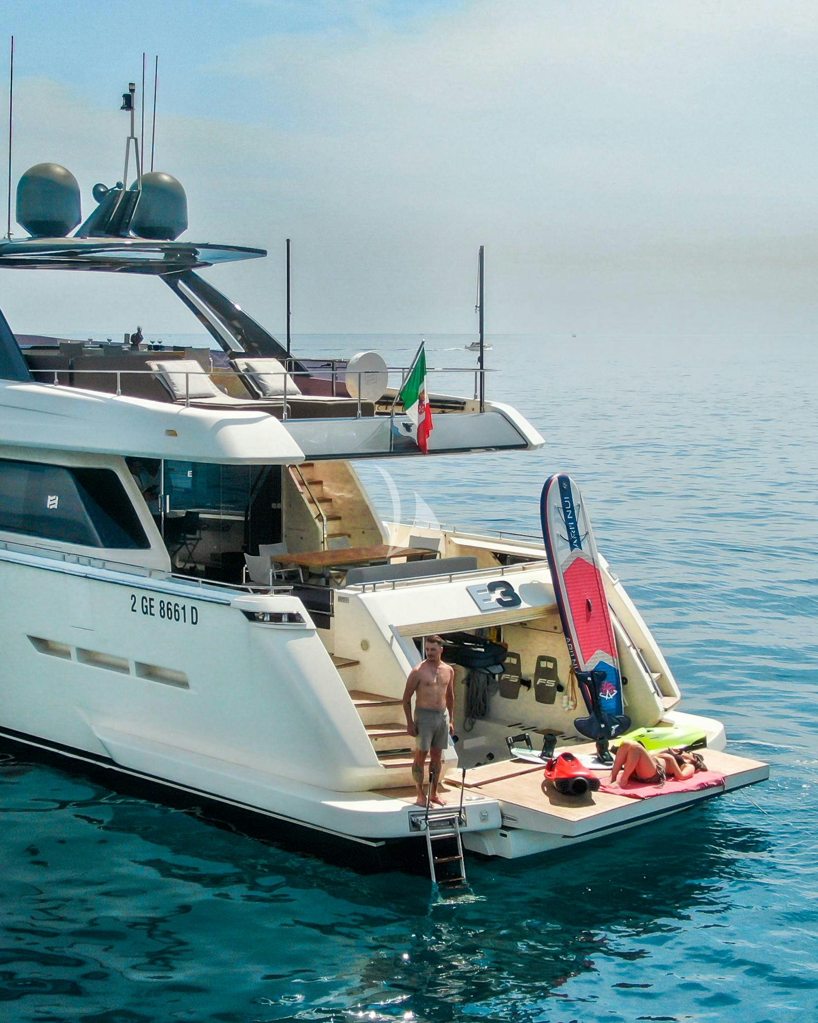 a person standing on a boat aboard E3 Yacht for Charter