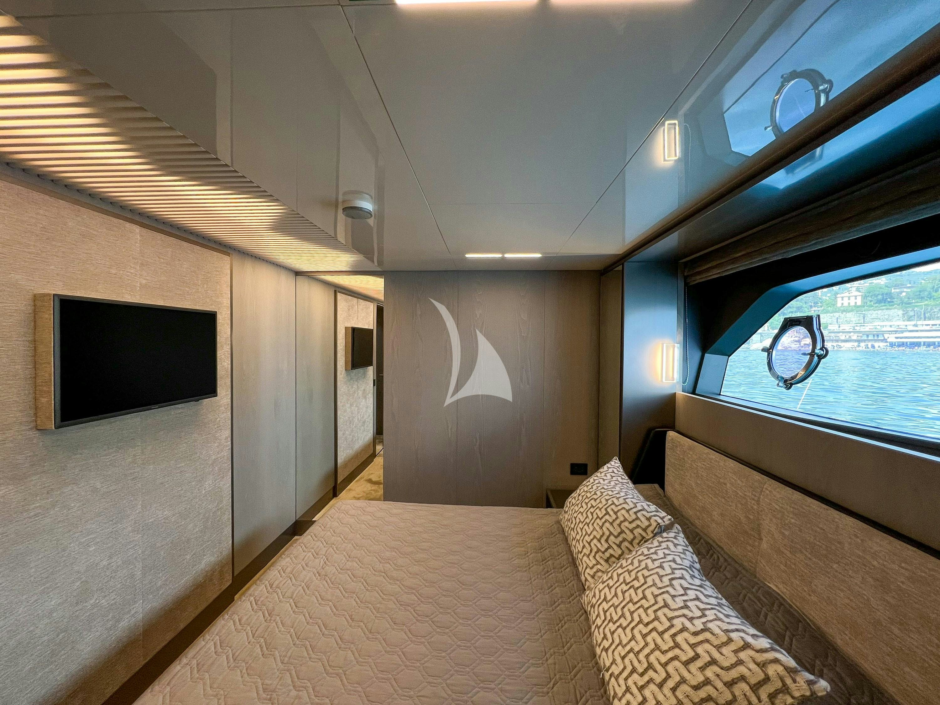 a bed in a room aboard E3 Yacht for Charter