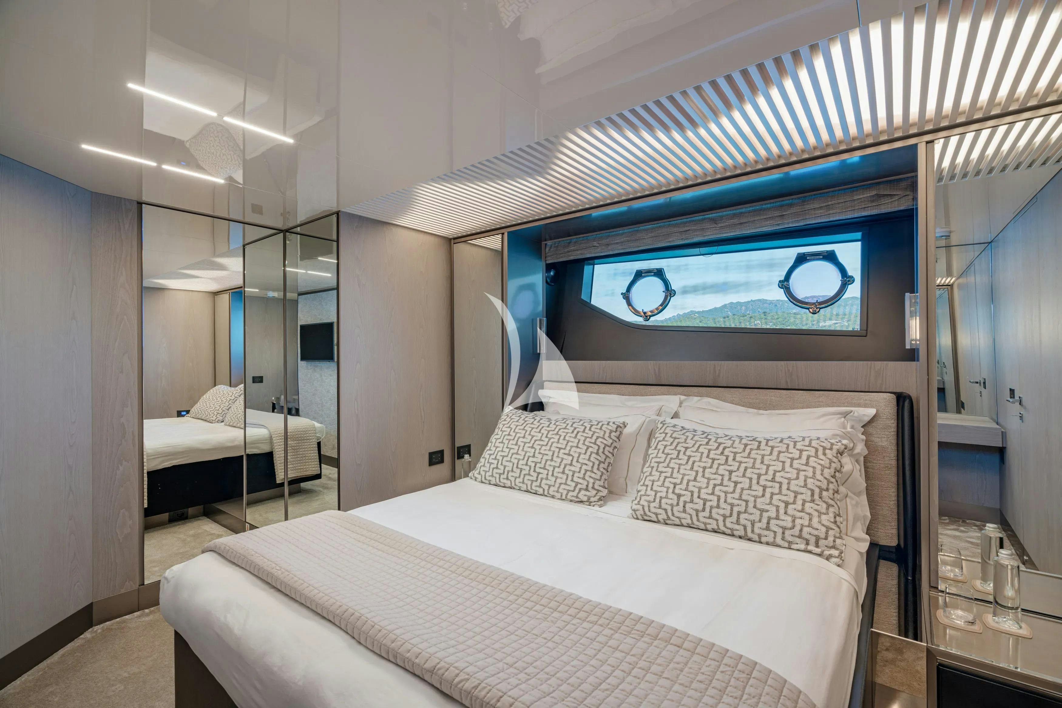 a bed in a room aboard E3 Yacht for Charter