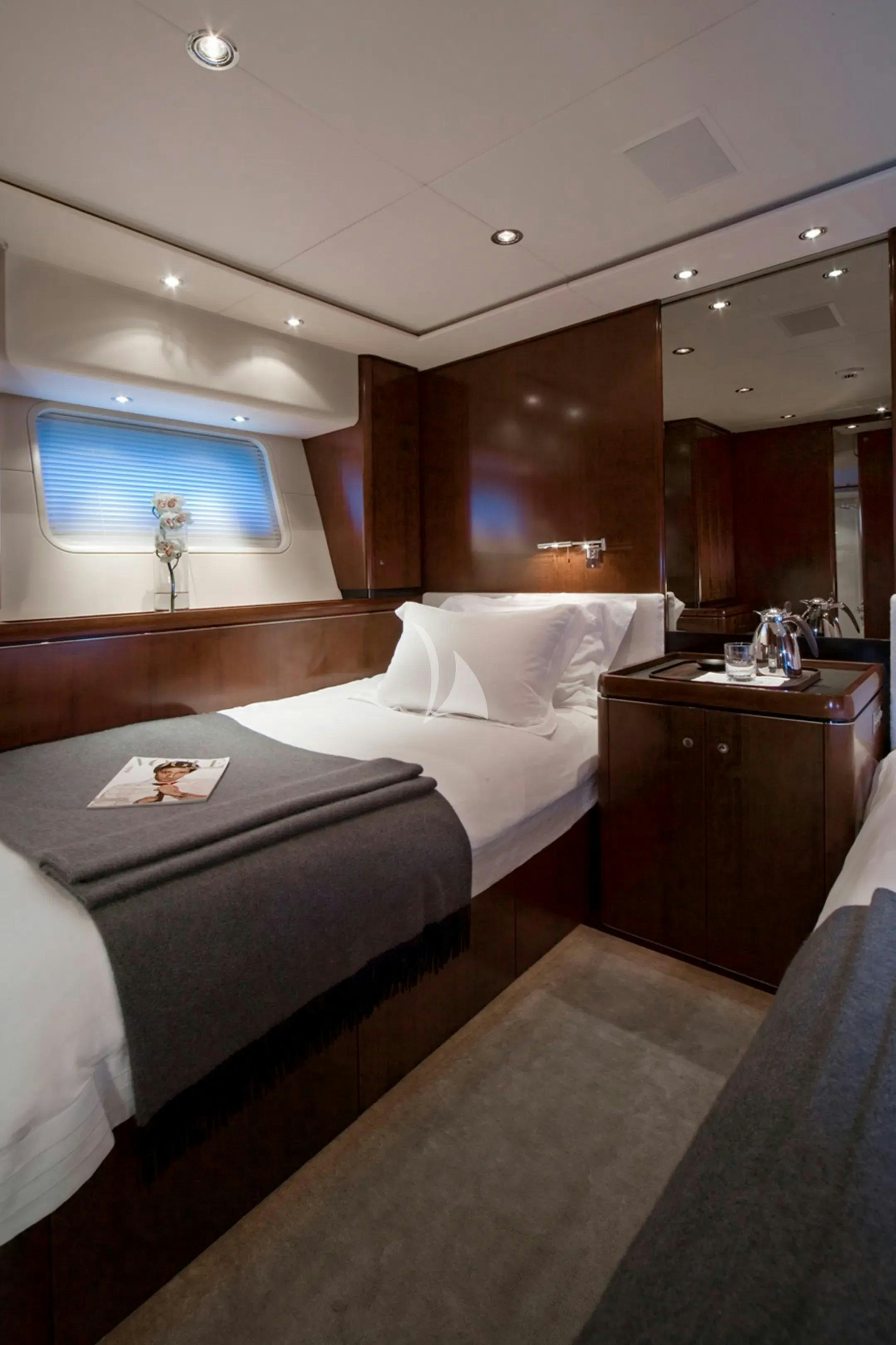 a room with two beds aboard MYSTERE Yacht for Charter