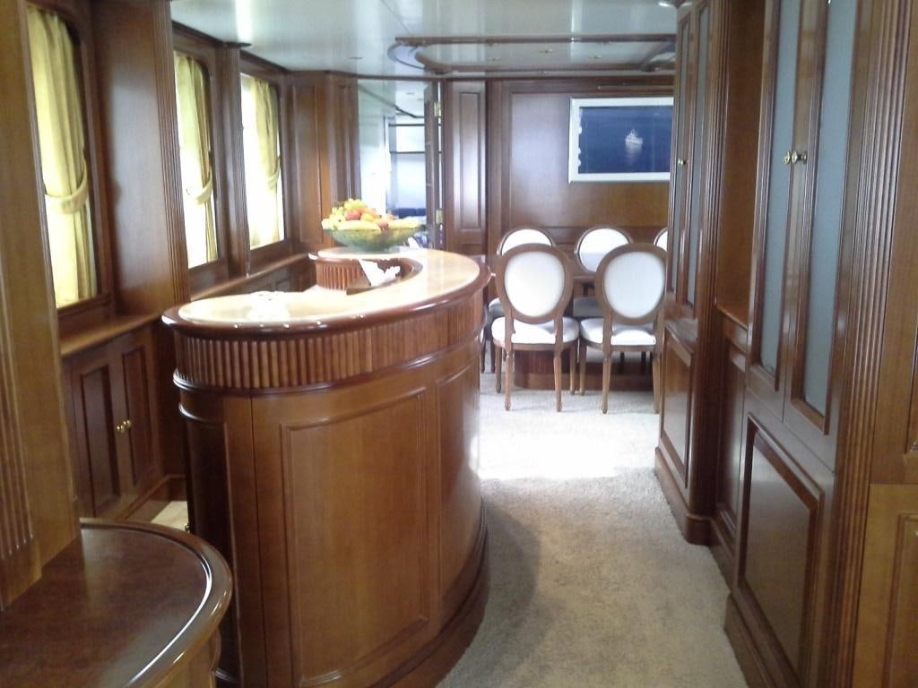 a bathroom with a large wooden tub aboard INOUIS Yacht for Charter