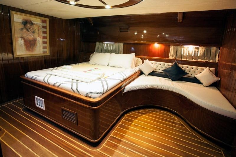 a couple of beds in a room aboard ESMA SULTAN Yacht for Charter