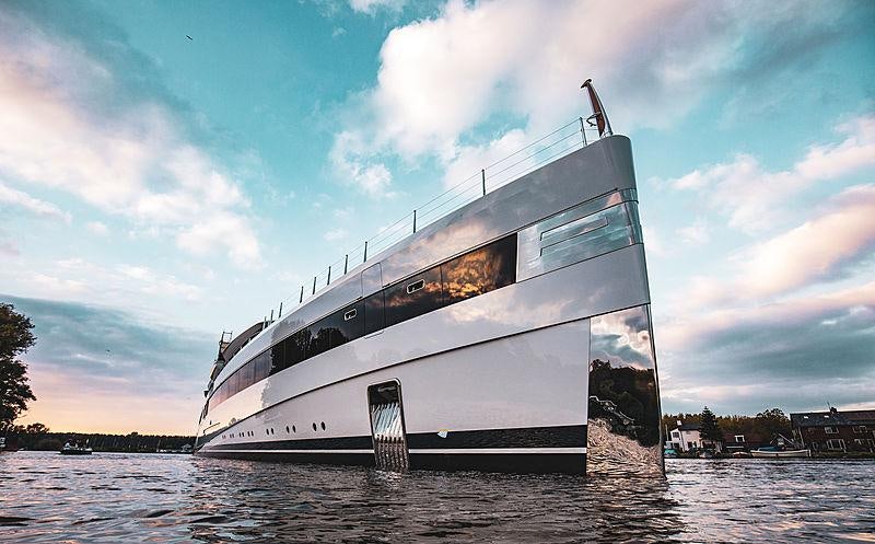 a large ship in the water aboard LADY S Yacht for Charter