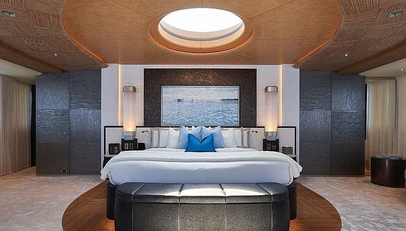 a large bedroom with a large bed aboard BARBARA Yacht for Charter