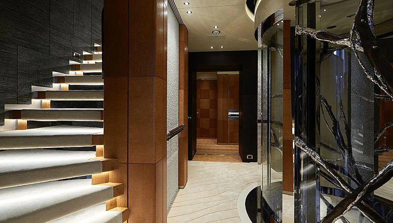 a room with a staircase and doors aboard BARBARA Yacht for Charter