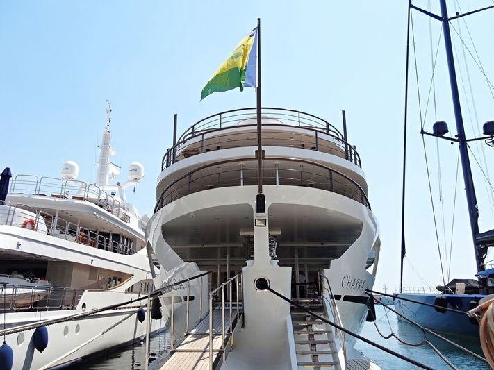 a boat docked at a pier aboard CHAKRA Yacht for Charter