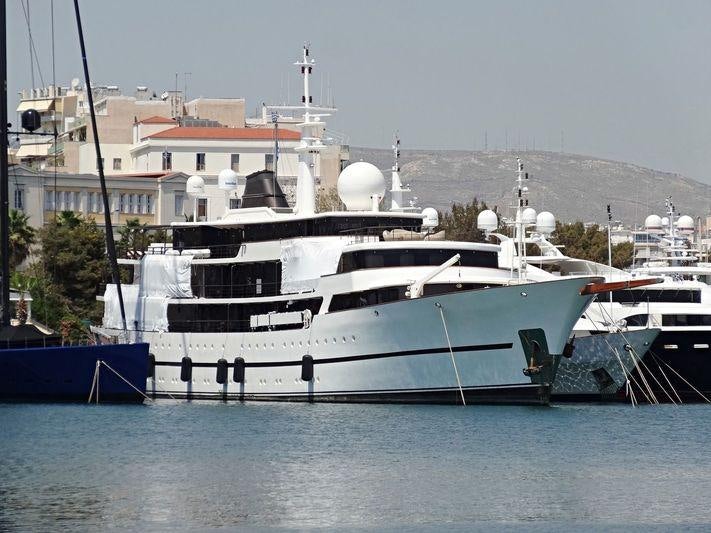 a large white boat in the water aboard CHAKRA Yacht for Charter