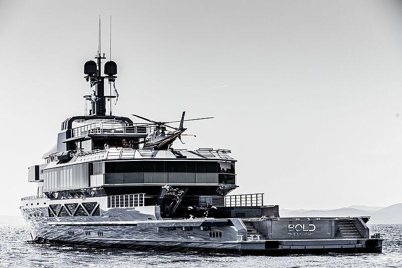 a large ship in the water aboard BOLD Yacht for Sale