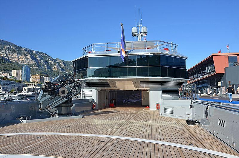 a large ship docked at a port aboard BOLD Yacht for Sale