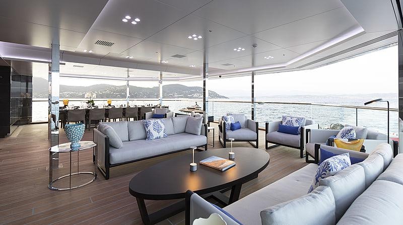 a living room with a large window aboard BOLD Yacht for Sale