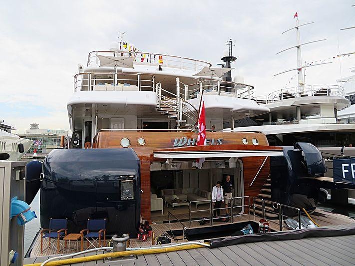 a large ship docked aboard WHEELS Yacht for Charter