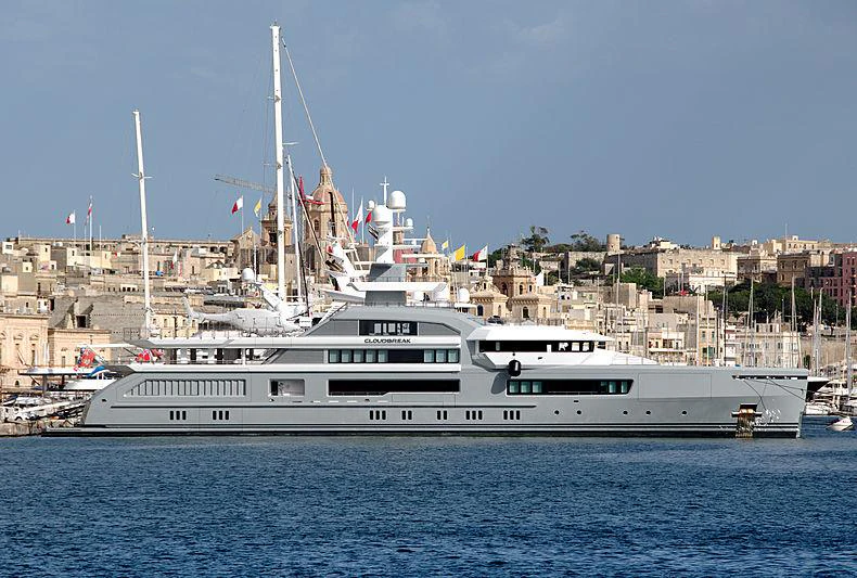 a large white boat in the water aboard CLOUDBREAK Yacht for Charter