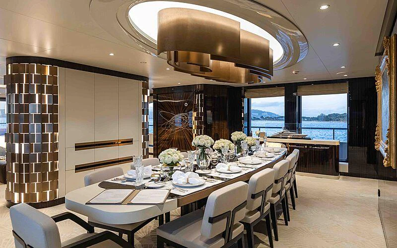 a dining room with a large table aboard SOARING Yacht for Charter