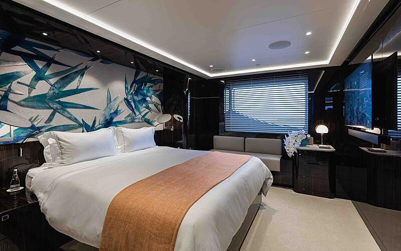 a large bedroom with a large bed aboard SOARING Yacht for Charter