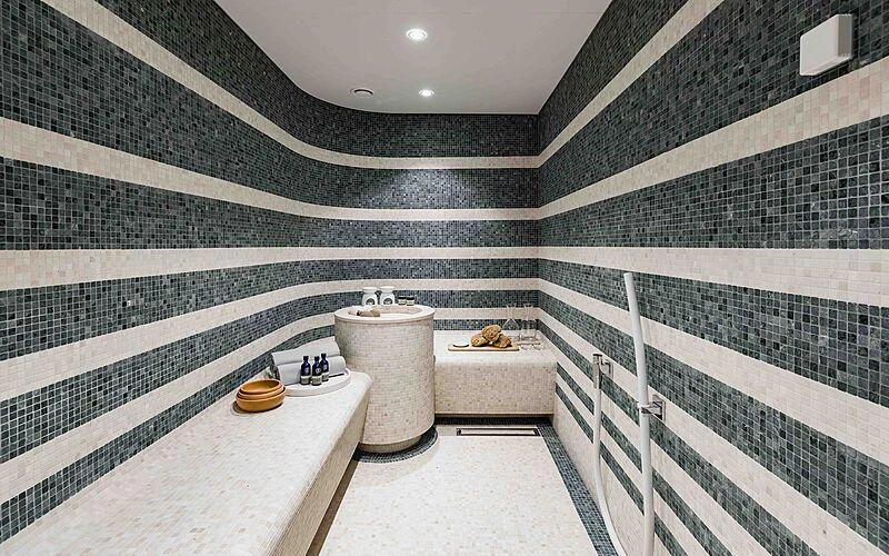 a bathroom with a tub sink and toilet aboard SOARING Yacht for Charter