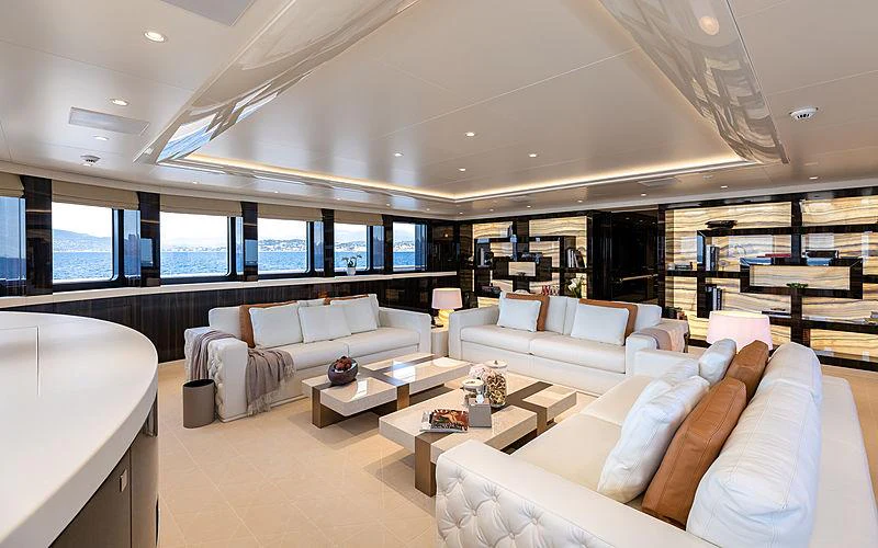 a large living room with a large window aboard SOARING Yacht for Charter
