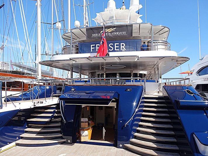 a large cruise ship docked aboard SYCARA V Yacht for Charter