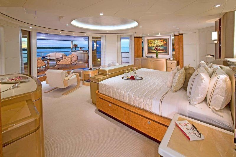 a large bedroom with a large bed aboard SYCARA V Yacht for Charter