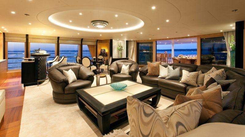 a living room with a large window aboard VENTUM MARIS Yacht for Charter