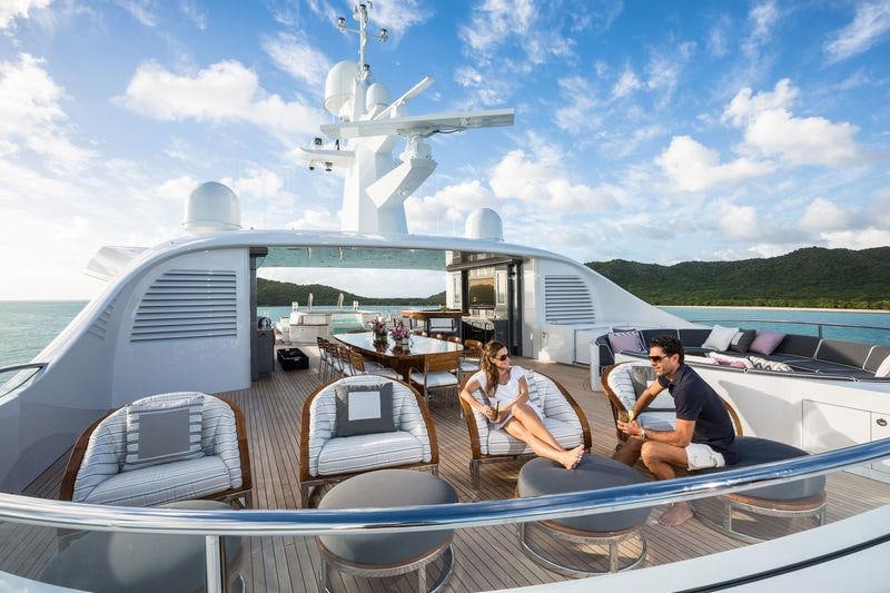 a group of people on a boat aboard INVICTUS Yacht for Charter