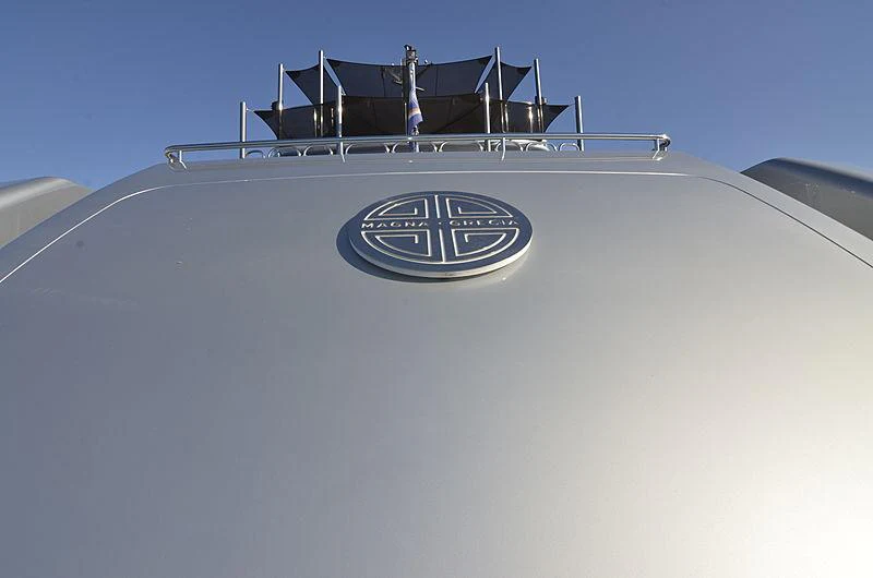 a close-up of a white boat aboard MAGNA GRECIA Yacht for Charter