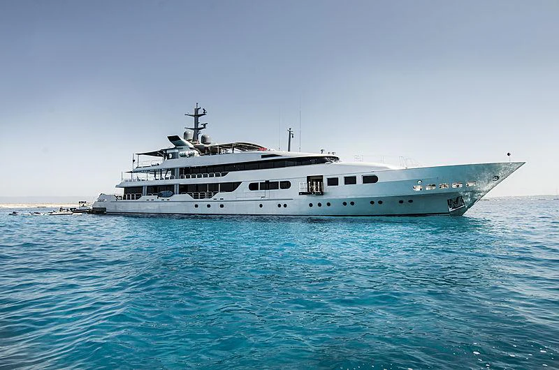 a large white boat in the water aboard MAGNA GRECIA Yacht for Charter