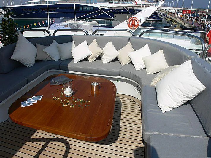 a table with pillows on it aboard MAGNA GRECIA Yacht for Charter