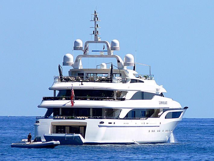 a large white boat in the water aboard LIONESS V Yacht for Charter