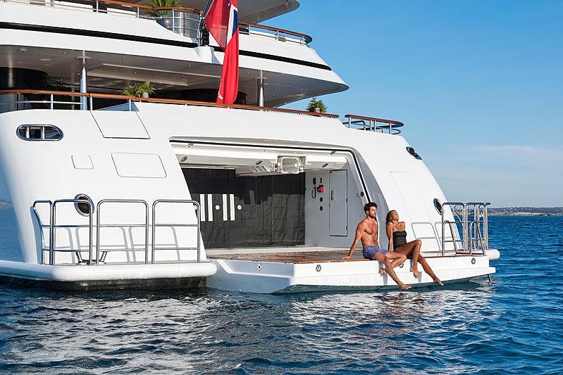 two people sitting on a boat aboard SOUNDWAVE Yacht for Charter
