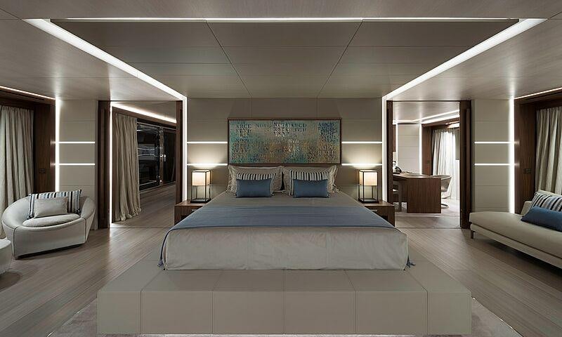 a large bedroom with a large bed aboard UTOPIA IV Yacht for Charter