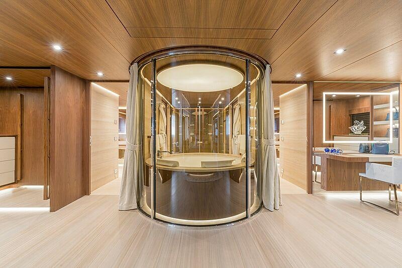 a large mirror in a room aboard UTOPIA IV Yacht for Charter