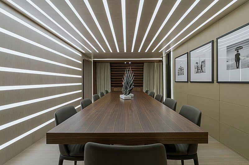 a room with a table and chairs aboard UTOPIA IV Yacht for Charter