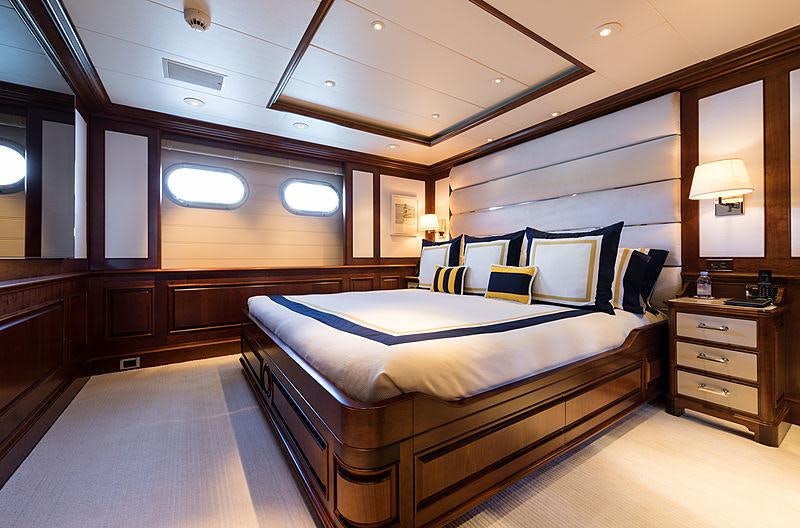 a hotel room with a bed aboard FLAG Yacht for Charter