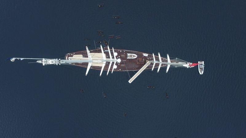 a space shuttle flying in the sky aboard ATHOS Yacht for Charter