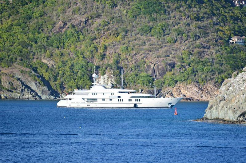 a white boat on the water aboard CALYPSO Yacht for Charter