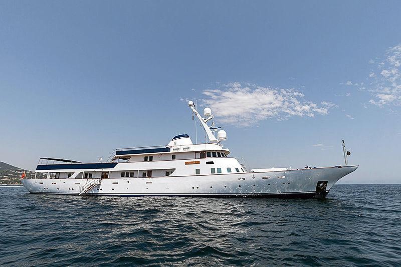 a white boat in the water aboard PALOMA Yacht for Charter