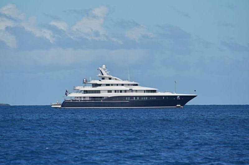 a large white ship in the water aboard ARIENCE Yacht for Charter